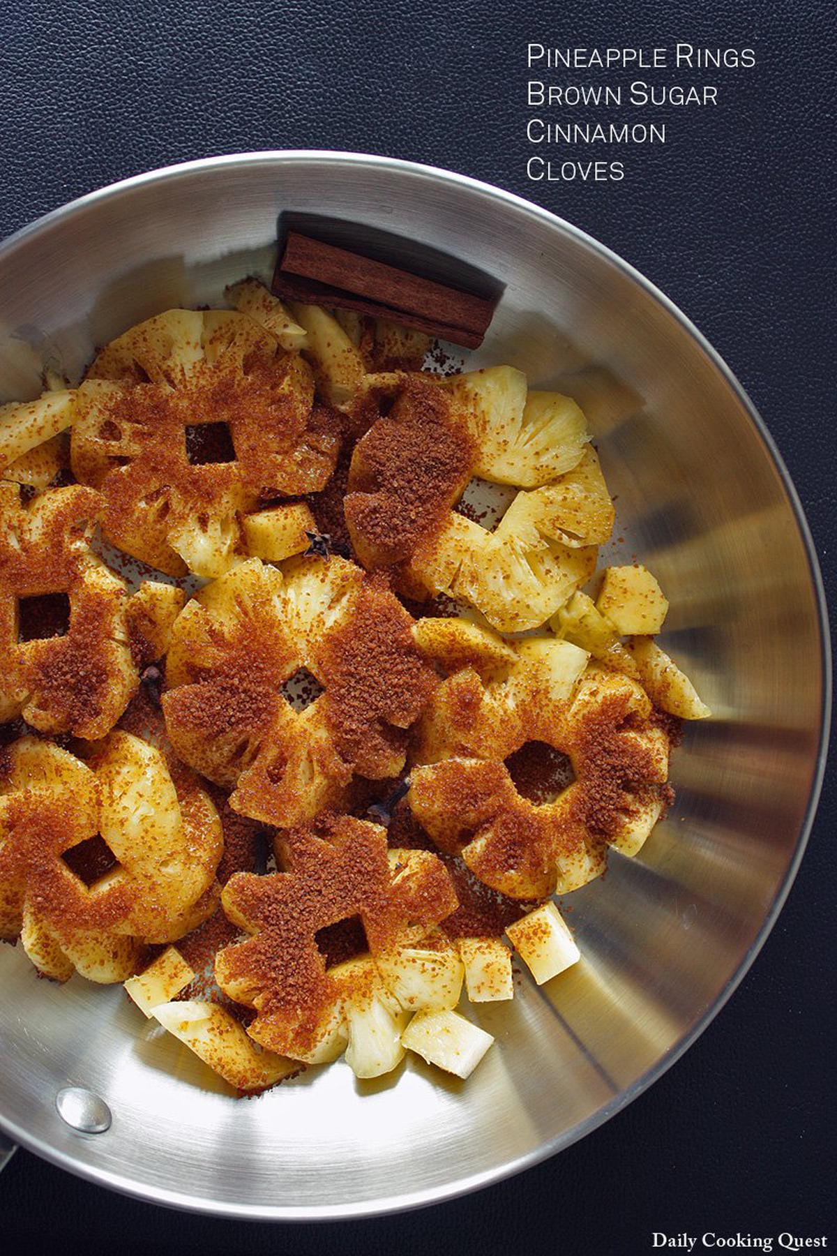 First, saute pinapple rings, brown sugar, cinnamon stick, and cloves in a pan.